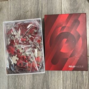 New Peloton puzzle . Never used . Outside box’s has spots on it . 20 obo
